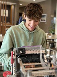 Student with robotics