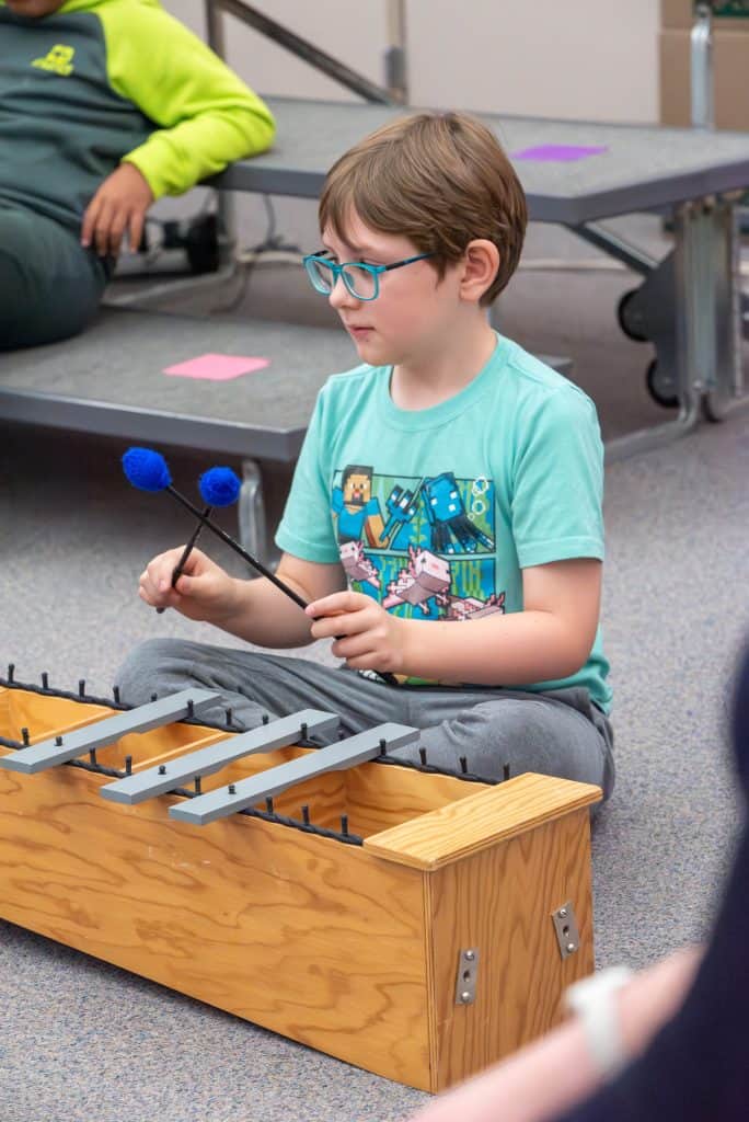 Student in Katelyn Roberts music class