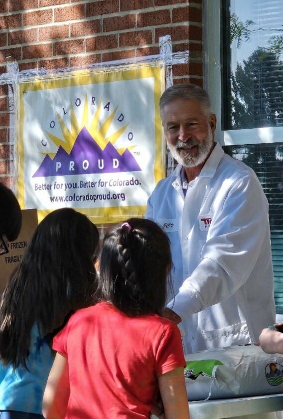 Colorado Proud School Meal Day interactive table with students